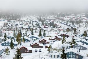 photo of a picturesque town covered in snow