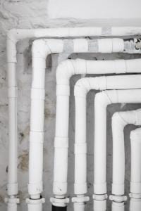 photo of pipes in a basement